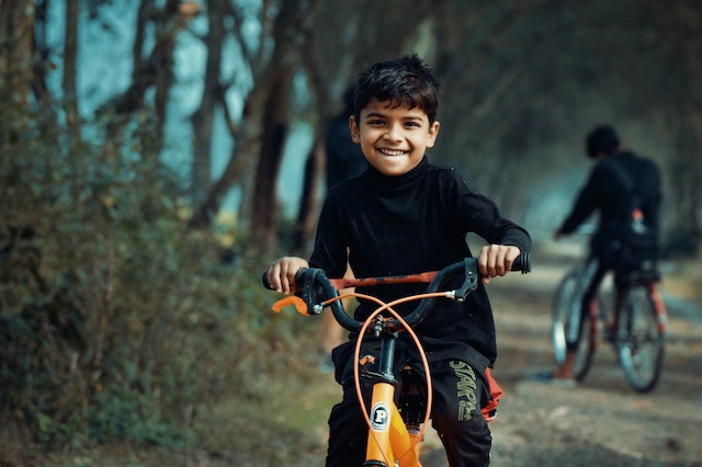 Healthy boy on a bike